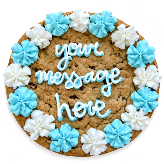 Light blue and white cookie cake with custom message and piped frosting border.