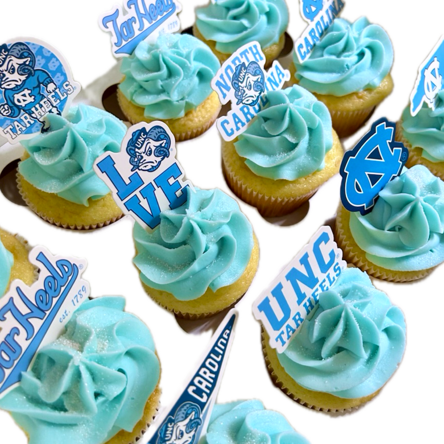 Light Blue Cupcakes with UNC Toppers
