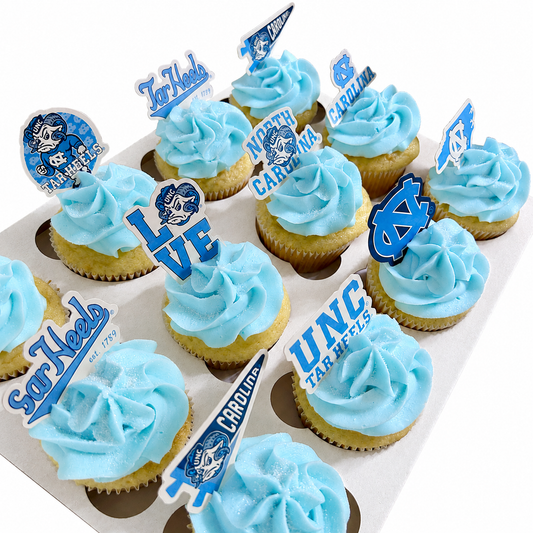 Light Blue Cupcakes with UNC Toppers