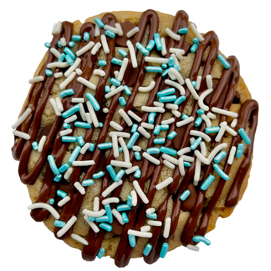 Light blue sprinkle cookie with chocolate drizzle and white and light blue sprinkles.