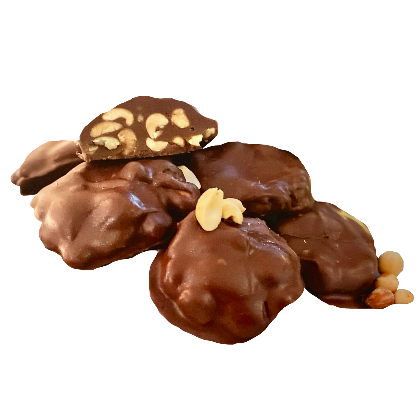 Vegan chocolate peanut clusters with one cluster cut open.
